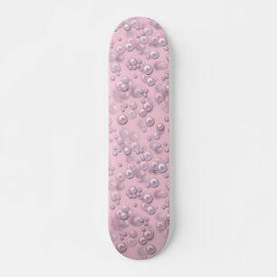 Placerare av pärlor av vit rosa på rosa sammet mini skateboard bräda 18,5 cm