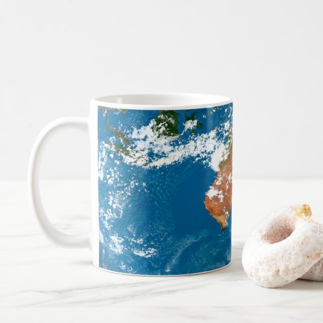 Planet Earth visar moln över Australien. Kaffemugg (Med munk)