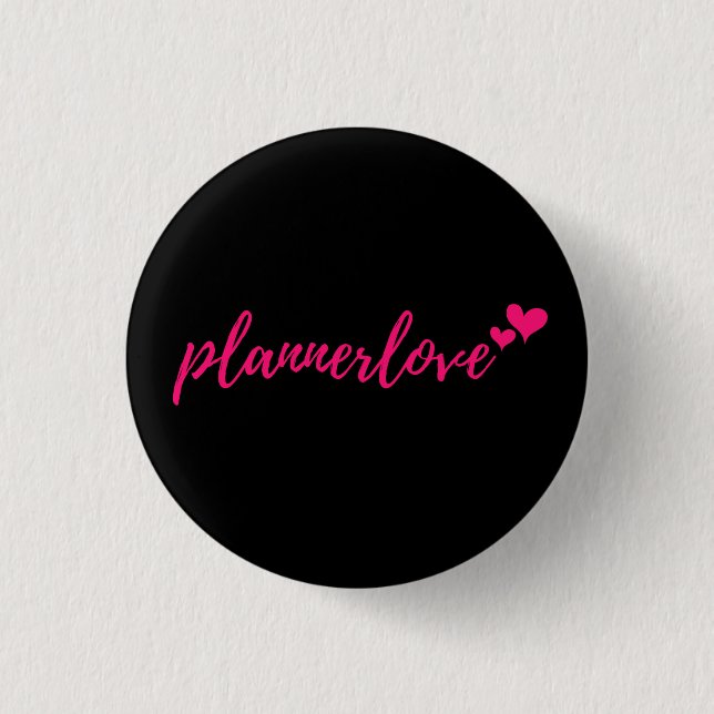 Plannerlove klämmer fast den svart väderkornet knapp (Framsida)