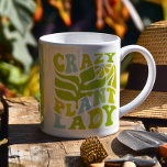 Plant Älskare Anpassningsbar Kaffemugg<br><div class="desc">Få redo att upphöja besattheten hos din anläggning med den här vibrerande muggen "Crazy Plant Dam"! Perfekt som växt-älskare-gåva, mugg är anpassade, vilket gör att du kan lägga till namn i din favoritplanta, galna dam och göra den unik för deras. Vare sig du tappar morgonkaffe eller vattnar din växt spädbarn...</div>
