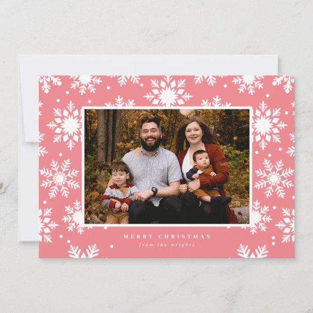 Platta vita feta snöflingor i bakgrunden  julkort (Framsida)