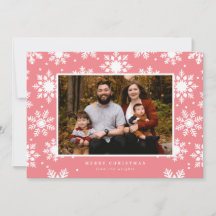 Platta vita snöflingor i fet stil i bakgrunden 