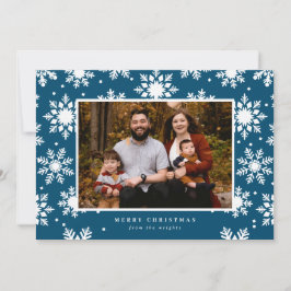 Platta vita snöflingor i fet stil i bakgrunden  julkort