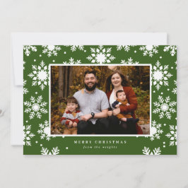 Platta vita snöflingor i fetstil i bakgrunden  julkort