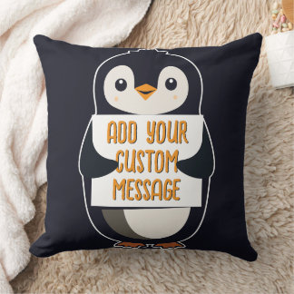 Playful penguin with a sign for your message kudde