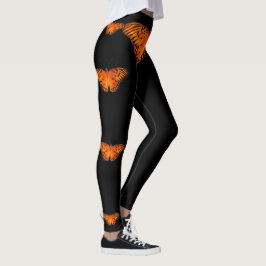 Plockfjäril på orange på mörk leggings