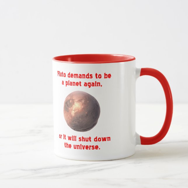 pluto kräver att få vara en planet igen... mugg (Höger)