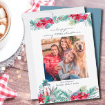 Poinsettia Lantern Avslappnad Script-julfoto Julkort<br><div class="desc">Julfotokort med ett av dina favoritfoton. Kortet är skrivet med avslappnad och klassisk typografi,  som alla kan redigeras. Fotomallen är inställd för visning av bild i kvadratiskt format. Konstruktionen har vattenfärgsträdgårdar av vintergröna och jultomor (poinsettia,  gräs,  mistletoe,  holly och bär) med kanin och ljus.</div>