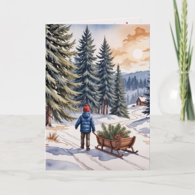 Pojke drar en släde med julgranskvistar kort (Framsida)
