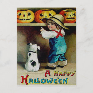 Pojke & hans hund tittar på Jack O' Lanterns Vykort