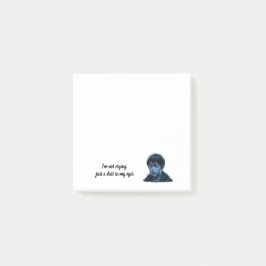 Pojke med tårar efter det post-it block