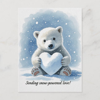 Polar bear in the snow with heart shaped snowball vykort
