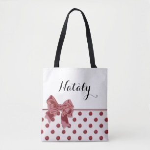 Polka dots mönstrar med pilbågen. monogram. tygkasse