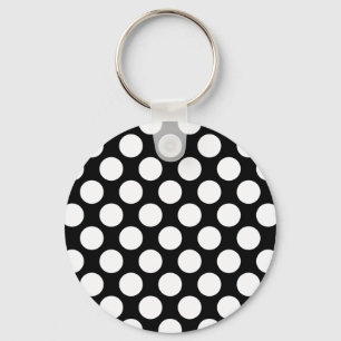 Polka dots på svart nyckelring