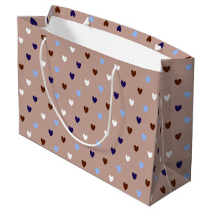 Polka-hjärtan på blek brun
