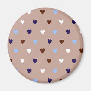 Polka-hjärtan på blek brun magnet