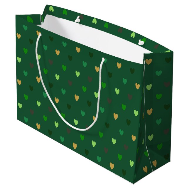 Polka-hjärtan på grönt av skogar (Baksidan Vinklad)