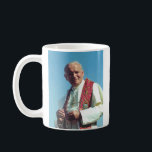 Polsk påve Johannes Paul II Kaffemugg<br><div class="desc">Den polske påven Johannes Paulus II var chef för den katolska kyrkan och överordnad Vatikanstaten från 1978 till hans död 2005. Han blev senare kanoniserad som påven Johannes Paulus II.</div>