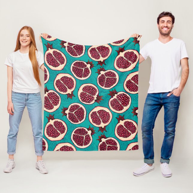 Pomegranatskivor på turkos fleecefilt (På plats)