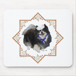 Pomeranian hund med snigelskal musmatta