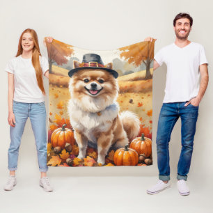 Pomeranian i höstlöv tackgivande konst fleecefilt