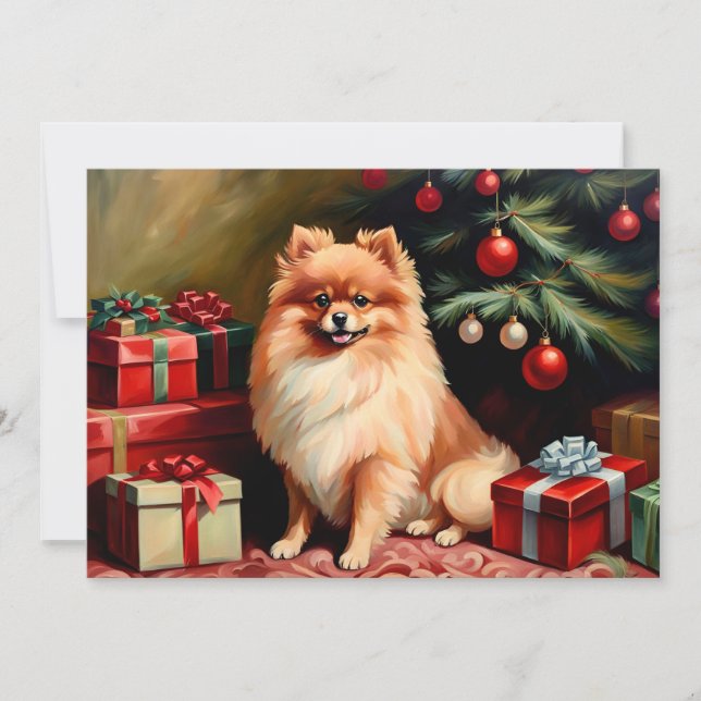 Pomeranian sittande vid julgranen kort (Framsida)