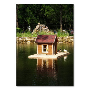 Pond med fågelhus bordsnummer
