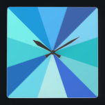 Pop Art Modern 60s Funky Geometric Rays in Blue Fyrkantig Klocka<br><div class="desc">This hip,  retro 60s-inspired pop art square clock has psychedelic blue rays / sunbursts shooting out in a geometric pattern. There are twelve rays to mark the time - no need for numbers on this funky,  minimalist,  ultra-mod clock. It's groovy,  baby.</div>