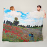 Poppy Fält, Monet Fleecefilt<br><div class="desc">Oscar-Claude Monet (14 november 1840-5 december 1926) var en Fransk målare, en av de Fransk Impressionistiska målningarna och den mest konsekventa och skickliga utövaren av rörelsens filosofi att uttrycka sina uppfattningar före naturen, särskilt när det gäller plätering av landskapsbilden i luft. Uttrycket ""Impressionism" härrör från titeln på hans målning Impression,...</div>