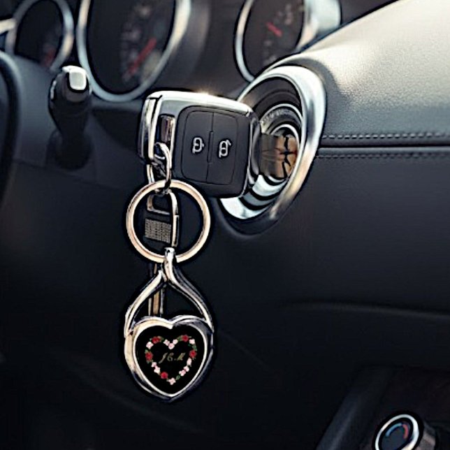 Porte-clés en métal noir avec un cœur rose et roug twisted heart silverfärgad nyckelring (Skapare uppladdad)