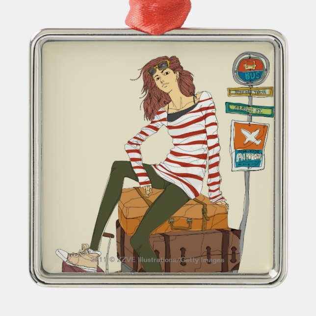 Porträtt av ung kvinnasitta på resväska julgransprydnad metall (Framsidan)