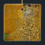 Porträtt i Adele Bloch-Bauer I av Gustav Klimt Julgransprydnad Keramik<br><div class="desc">Porträtt i Adele Bloch-Bauer I (1903-1907) av Gustav Klimt är en vintage av Viktorian Era Symbolism bra art porträtt. Porträtt i Adele Bloch-Bauer I kallas också Dam i Guld eller i Guld. I porträtt visas Adele Bloch-Bauer sitta på en guldstol framför en guldstjärnbakgrund. Hon bär en smyckad oker och en...</div>