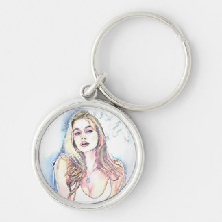 Porträtt i Hailey Rund Silverfärgad Nyckelring