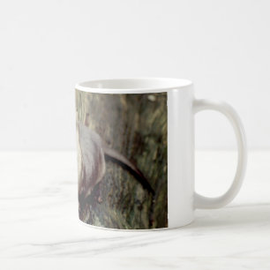 Posera för flodutter kaffemugg