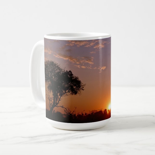PRAKTFULL SOLNEDGÅNG  KAFFEMUGG (Framsida vänster)
