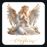 Praying jul Angel Fyrkantigt Klistermärke<br><div class="desc">De här julklistermärkena har en ängel där händer är inklämt i bön. Nedan står ord "God jul".</div>