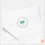 Preppy Green and Pink Wedding Pickleball Runt Klistermärke<br><div class="desc">These custom stickers are perfect for bachelorette parties, couples showers, weddings and more with a pickleball theme. These stickers feature illustrations of heart shaped pickleball paddles and a pickleball and are ready to be customized with your own headline, initials on the paddles and full names below all with a preppy...</div>