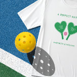 Preppy Green and Pink Wedding Pickleball T Shirt<br><div class="desc">Celebrate your love for one another and your love of pickleball at the same time with this personalized athletic shirt. It's perfect for wearing to the pickleball court and features illustrations of two heart-shaped pickleball paddles in green and a pink pickleball and is ready to be customized with your own...</div>