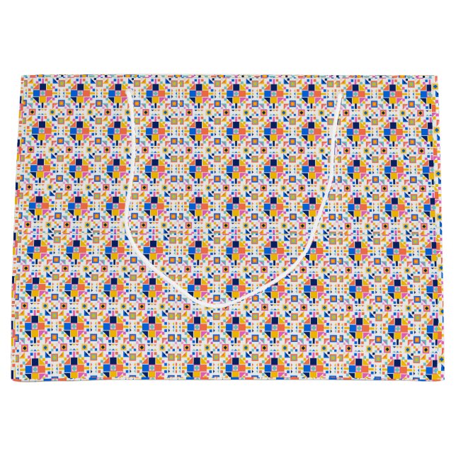 Presentförpackning med en färgrik geometrisk mönst (Framsidan)