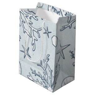 Presentpåse med korallrev, havsskal och sjöstjärna