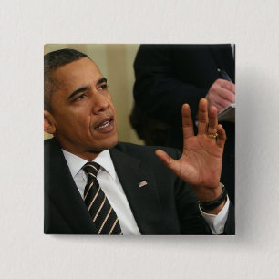 President Barack Obama talar till pressen Knapp