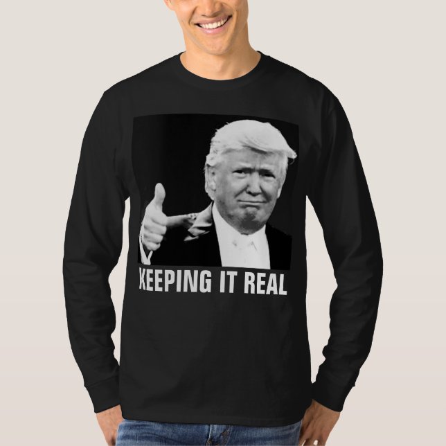 PRESIDENT DONALD TRUMP som håller den verkliga Tee (Framsida)
