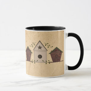 Primitiva fågelhus Mugg