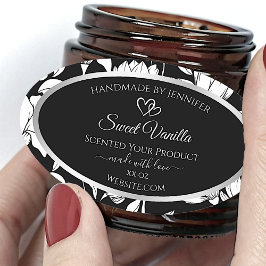 Produktetiketter för elegant Black and White Blomm Ovalt Klistermärke