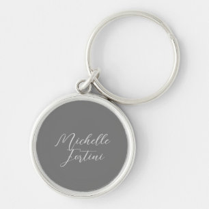 Professionell minimalist modern handstil namn rund silverfärgad nyckelring