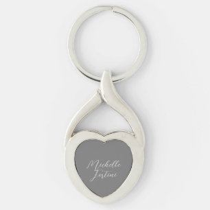Professionell minimalist modern handstil namn twisted heart silverfärgad nyckelring