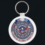 Proud American Air Force Daughter Nyckelring<br><div class="desc">This design features colorful American eagle with its wings widely spread. The eagle is located over the magic mandala and is decorated with the USA flag. The colorful text "Proud American Air Force Daughter" goes around the image. A beautiful family gift for a girl or woman. Do not forget to...</div>