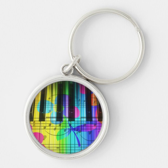 Psychedelic elektriska pianotangentbord och rund silverfärgad nyckelring (Framsidan)