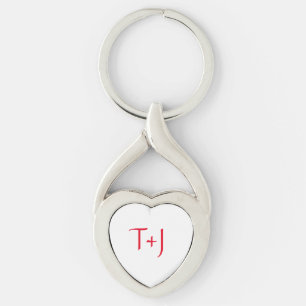 Puffigt hjärta twisted heart silverfärgad nyckelring