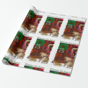 Puggle som väntar på jul presentpapper